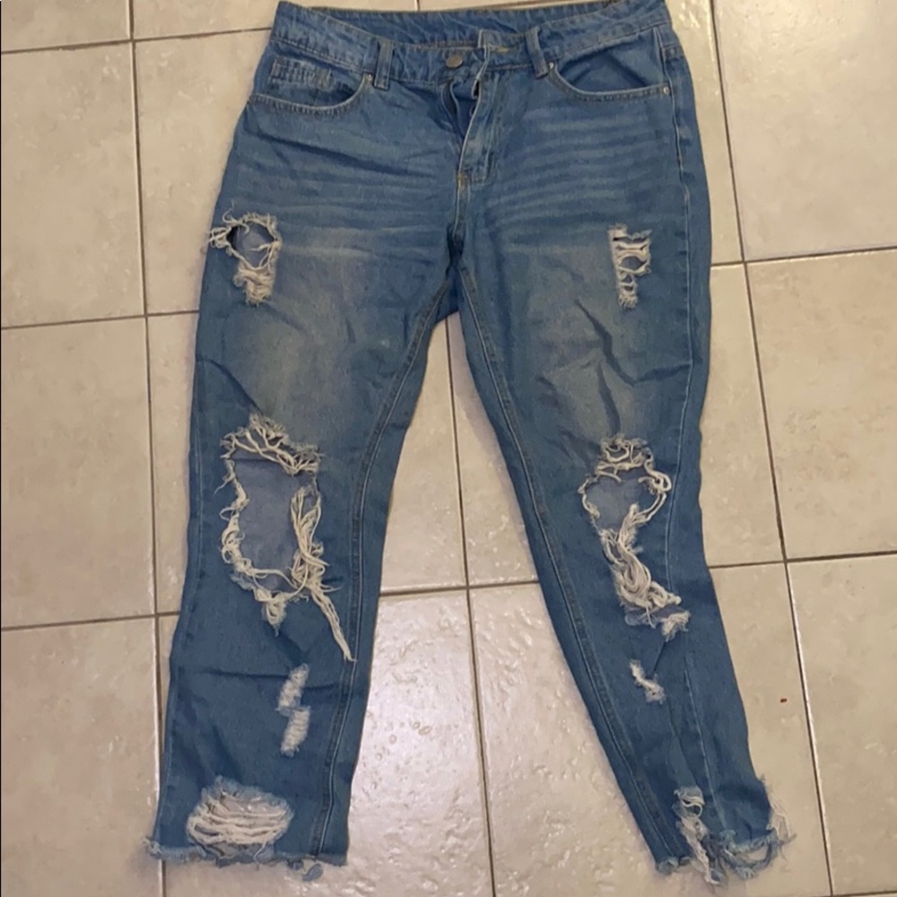 High waisted distressed jeans